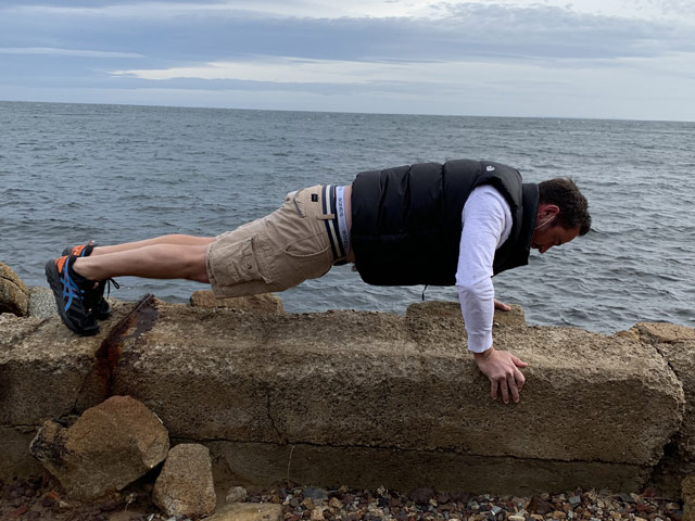 A person lying on a rock   with medium confidence