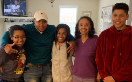 April’s four kids with her mom. The dynamics  have truly shifted, as her kids now assist her in the care of their grandmother.