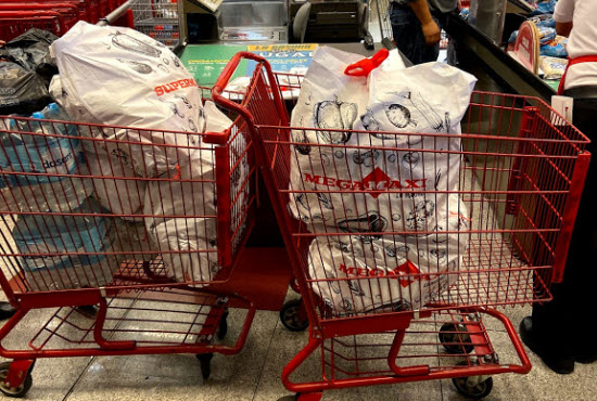 Shopping for the love baskets at a local store in Quito.