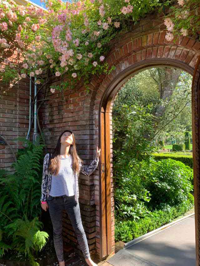 Crystal admires the  landscape design at the Fioli Historic House & Garden in California.