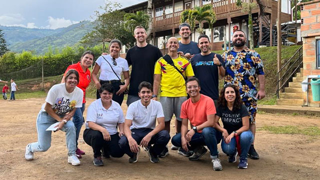 A group of people from the DNA Spaces  sales team posing for a photo in Colombia.