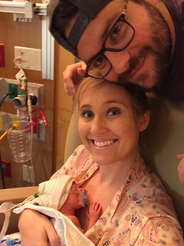 Emily, with her husband Chad, finally getting to hold baby Juliette.