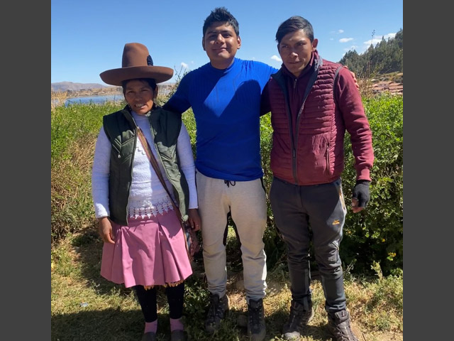 Jair with a Quechua family.