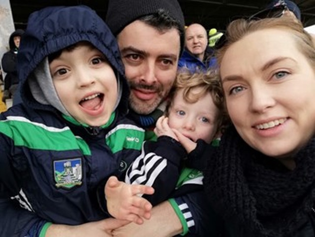 Charlotte with her husband and two boys celebrating and taking  in a final match day before their new arrival joins them.