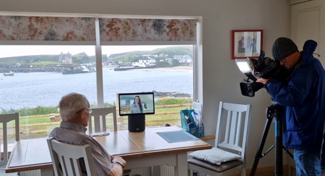 Clare Island resident on a call with his doctor on the mainland, while being filmed for our documentary.