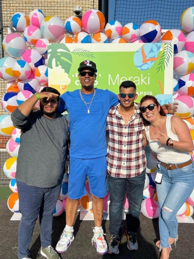 Lorenzo with fellow Cisco Merakians at a Chicago summer party in 2022.