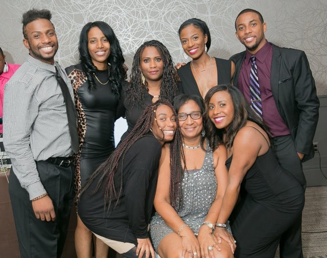 Pascale with her mom and siblings, who are always there to support each other.