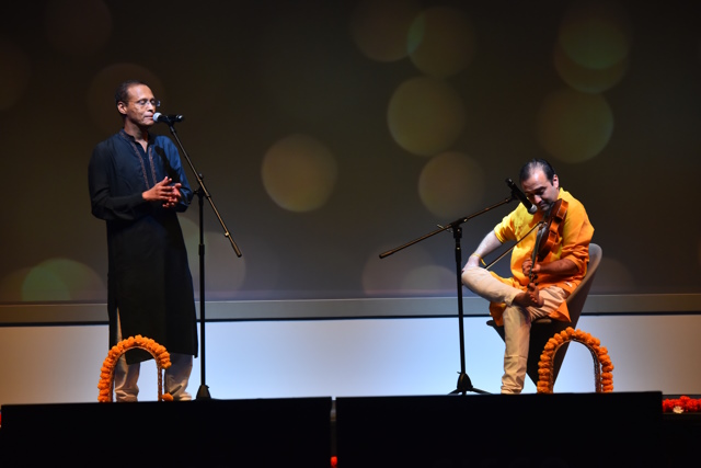 Shyam (left) performing with his teammate Business Operations Leader Anand Iyer at CXC APJC All Hands in November 2022.