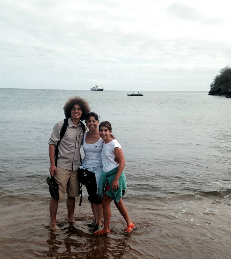 Serpil with her son and daughter exploring the places that inspired Darwin during a family vacation to the Galapagos Islands in 2014.