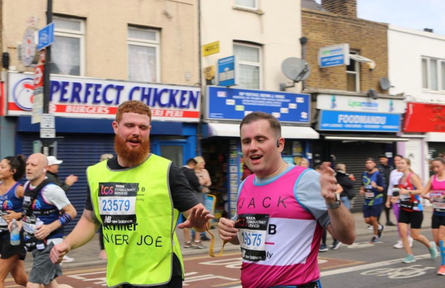 Jack with his guide  and trainer Joe Murray who ran alongside him during the marathon.