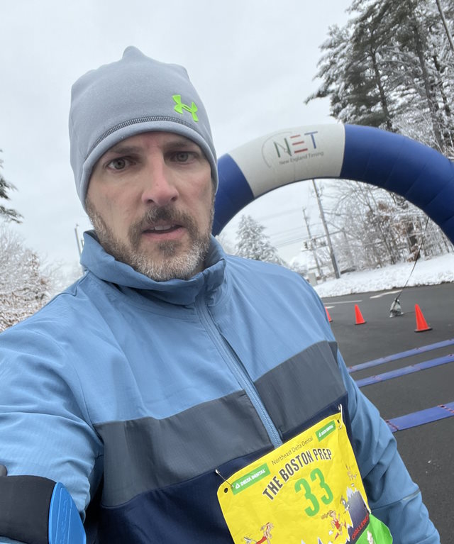 Chris outside in the  snow on a run.