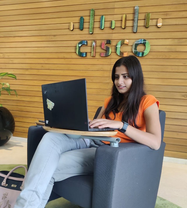 Rashmi at a Cisco office.