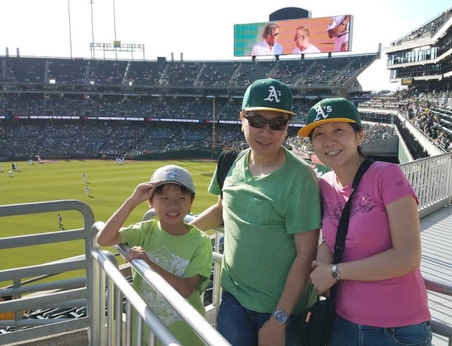 Gabby and her family at a baseball game.