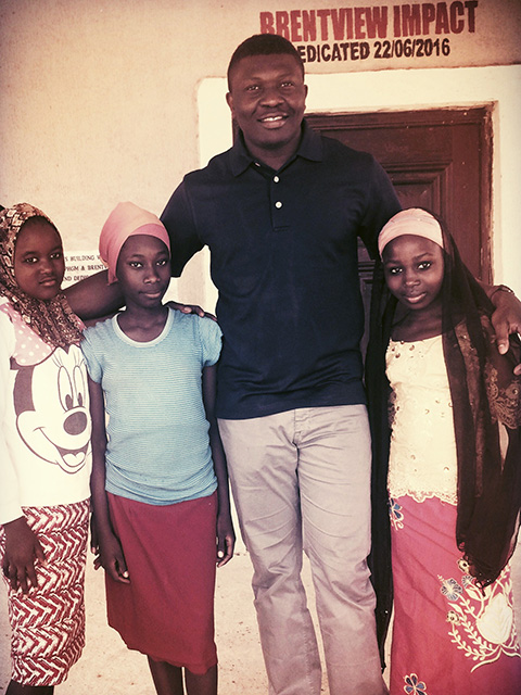 Photo of Julius With Students