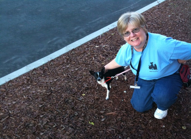 Kathy taking one of the shelter dogs for a walk