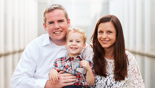 Photo of Jared Edens with his son Holden and wife Rachael